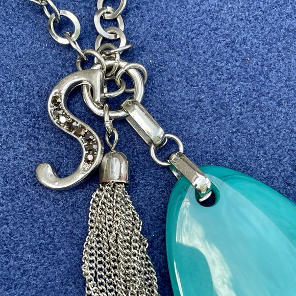 Silver colored necklace with large aqua colored stone, letter S & silver tassel - Picture 4 of 8